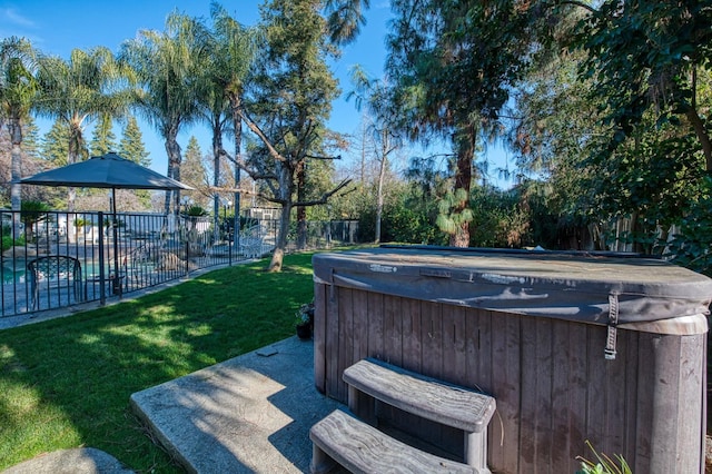 view of yard with a fenced in pool