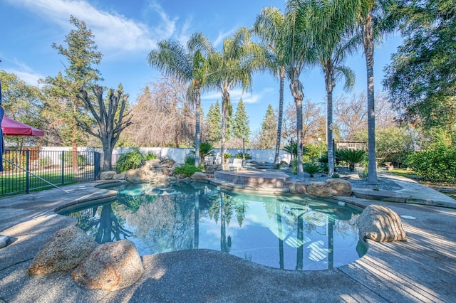 view of swimming pool with a patio area