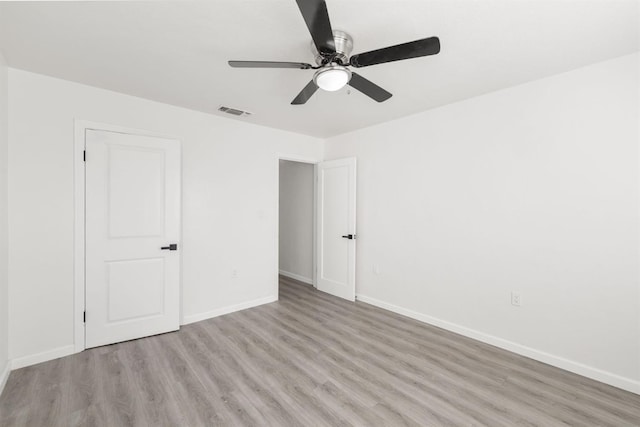 interior space with ceiling fan and light hardwood / wood-style flooring