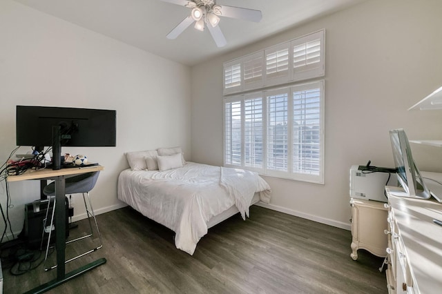 bedroom with dark wood-type flooring and ceiling fan