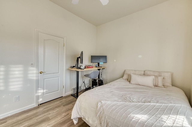 bedroom featuring ceiling fan and hardwood / wood-style floors