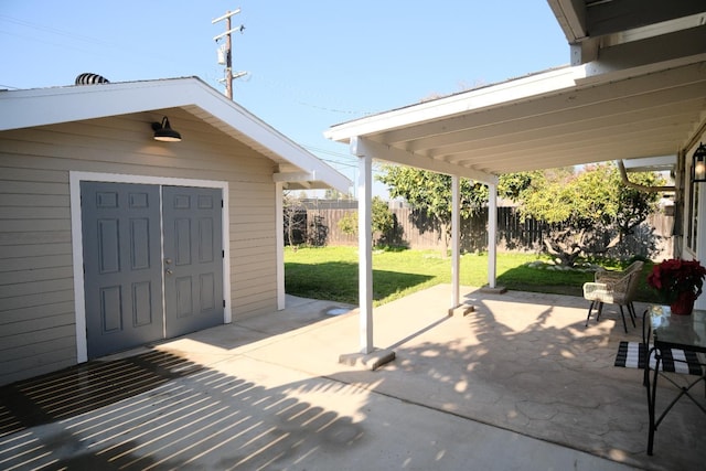 view of patio / terrace with a storage unit