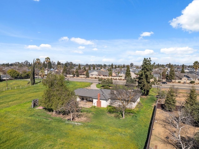 birds eye view of property with a residential view