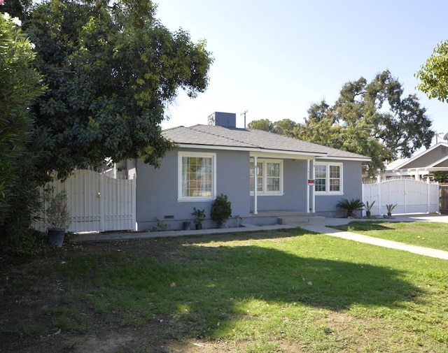 ranch-style house with a front yard