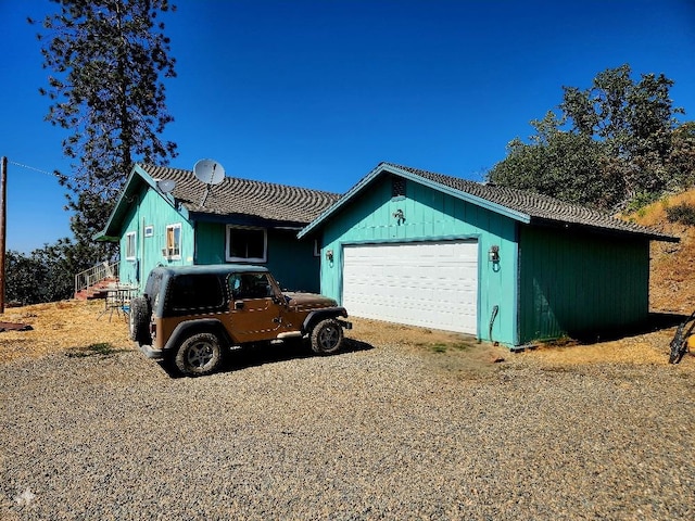 ranch-style home with a garage