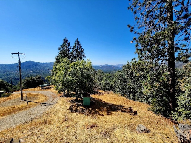 view of mountain feature featuring a rural view