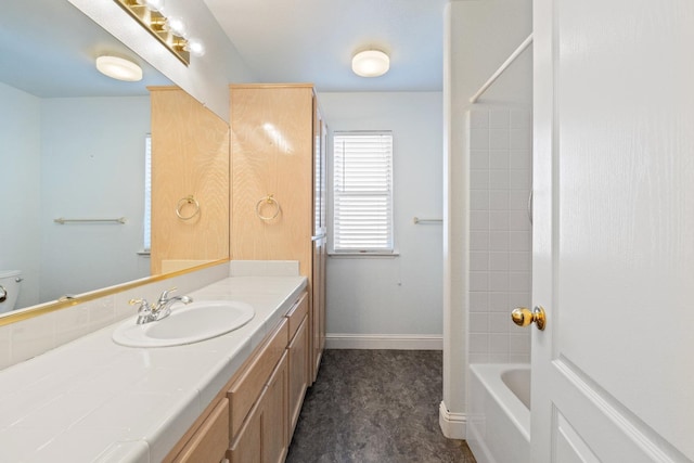 full bathroom featuring vanity, shower / bathtub combination, and toilet