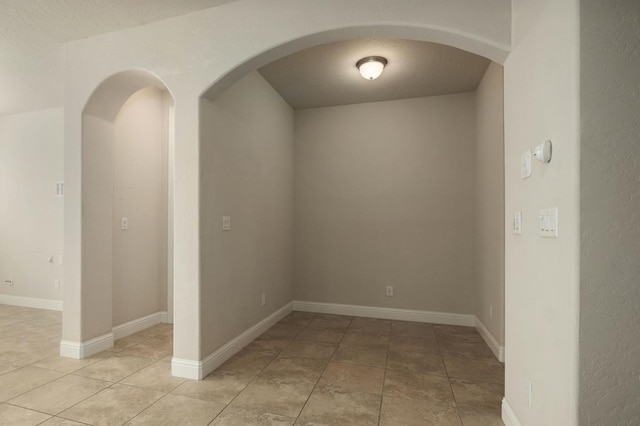 view of tiled spare room