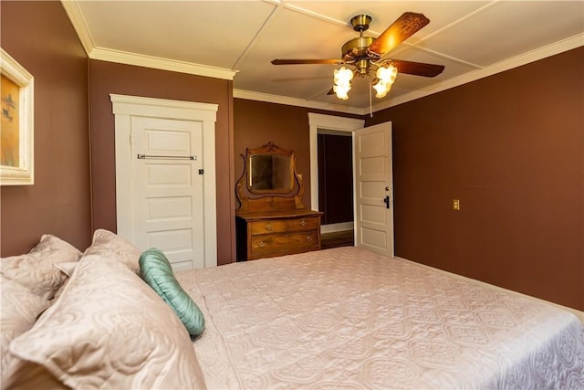 bedroom featuring ceiling fan and crown molding