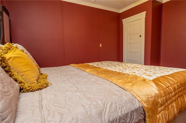 bedroom with crown molding