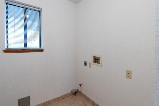 39627 Brandywine Ln, Oakhurst, CA 93644 - laundry room featuring washer hookup, light tile patterned flooring, hookup for a gas dryer, and electric dryer hookup