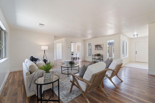 living room featuring dark hardwood / wood-style flooring