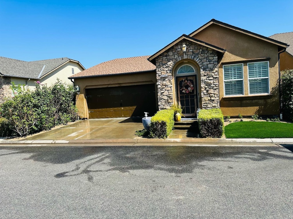 view of front of home with a garage