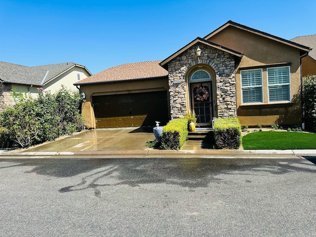 view of front of home with a garage