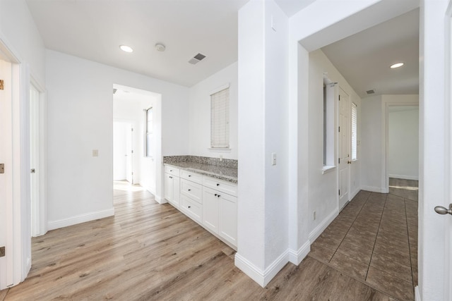 hallway featuring light wood-type flooring