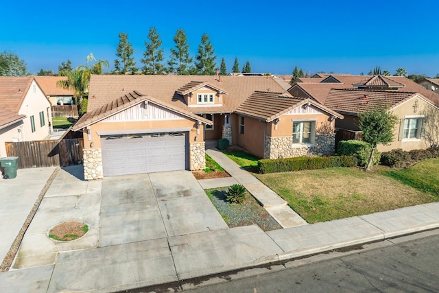 ranch-style home with a garage and a front yard