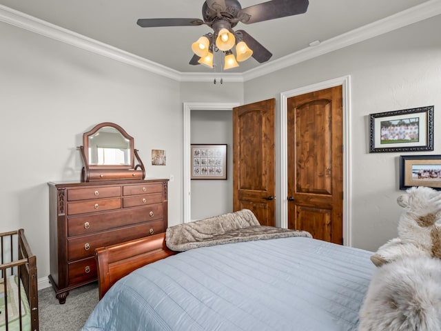 bedroom with light colored carpet, ceiling fan, and crown molding