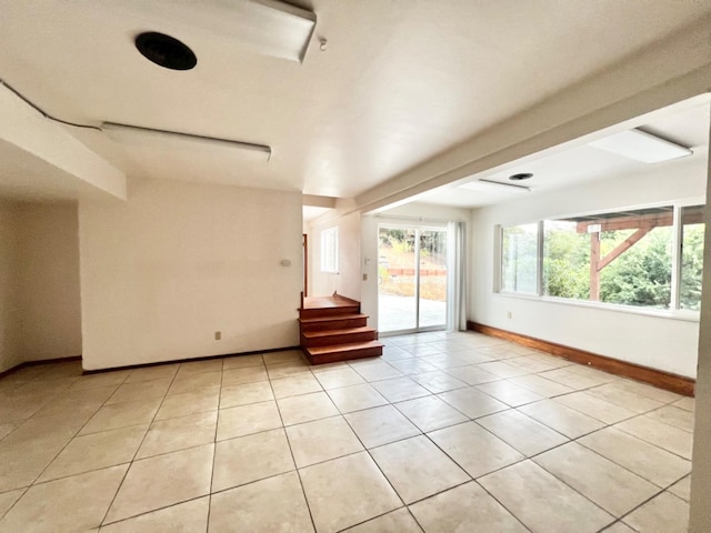 empty room featuring light tile patterned floors