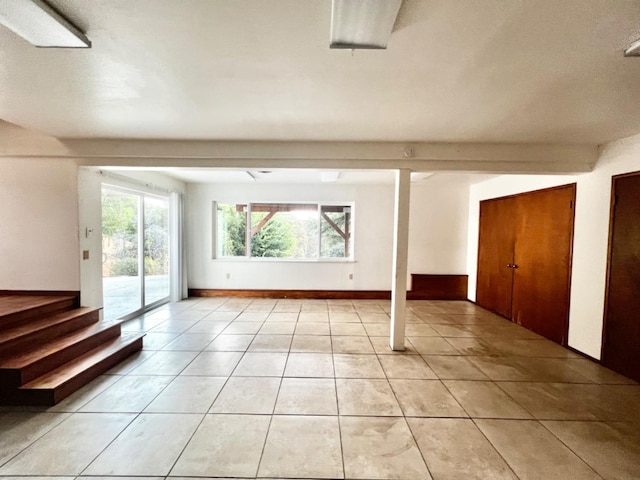 interior space with light tile patterned floors