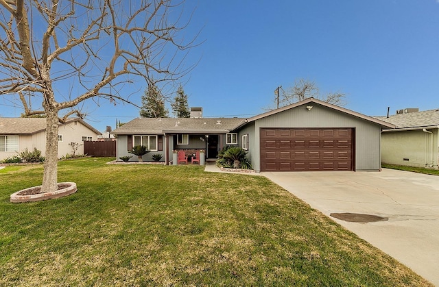 single story home with a garage and a front lawn