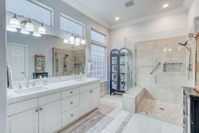 bathroom featuring walk in shower, tile patterned floors, crown molding, a chandelier, and vanity