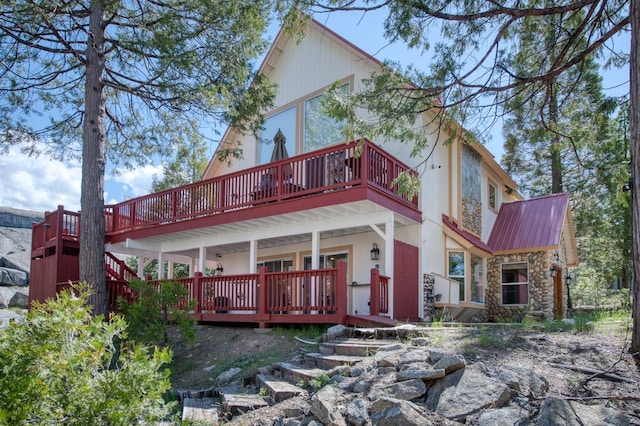 rear view of house with a deck