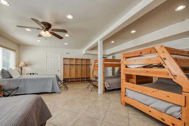 bedroom featuring light tile patterned floors and ceiling fan