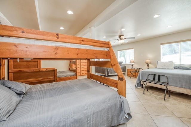 bedroom featuring ceiling fan and light tile patterned flooring