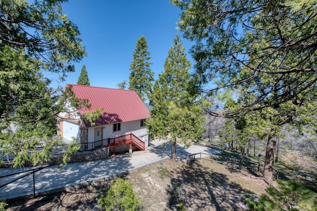 39722 Crest Point Ln, Shaver Lake, CA 93664 - view of yard with a wooden deck and stairway