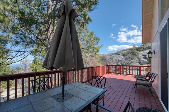 39722 Crest Point Ln, Shaver Lake, CA 93664 - deck with outdoor dining area