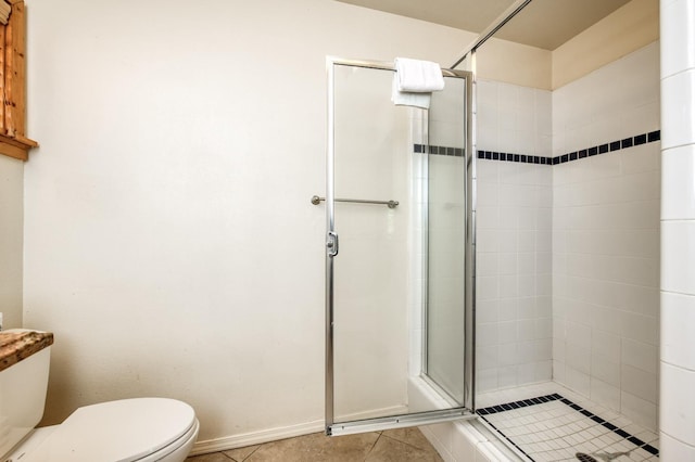 39722 Crest Point Ln, Shaver Lake, CA 93664 - full bathroom featuring a shower stall, toilet, and tile patterned flooring
