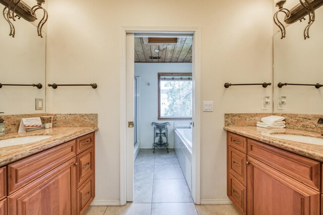 39722 Crest Point Ln, Shaver Lake, CA 93664 - bathroom featuring two vanities, a garden tub, a stall shower, and tile patterned flooring