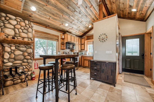 39722 Crest Point Ln, Shaver Lake, CA 93664 - kitchen featuring double oven range, black microwave, open shelves, wooden ceiling, and recessed lighting