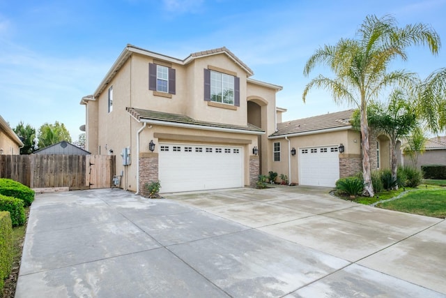 front of property with a garage