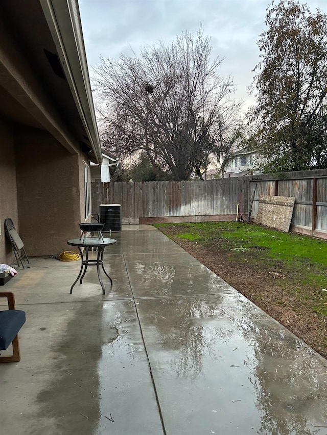 view of patio with central air condition unit