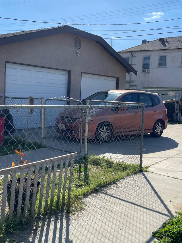 garage with fence