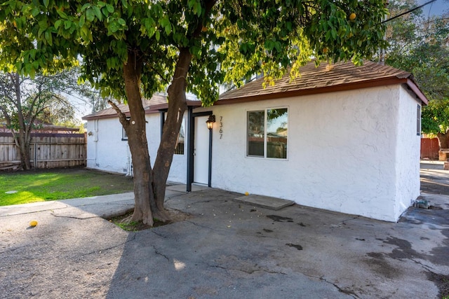 rear view of house featuring a patio