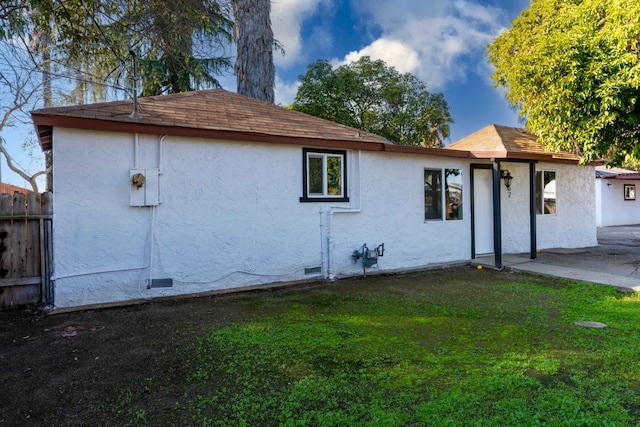 exterior space with a lawn