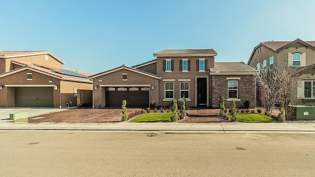 view of front of house with a garage