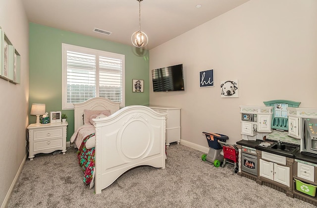 bedroom with light carpet