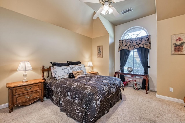 bedroom with light colored carpet, ceiling fan, and lofted ceiling