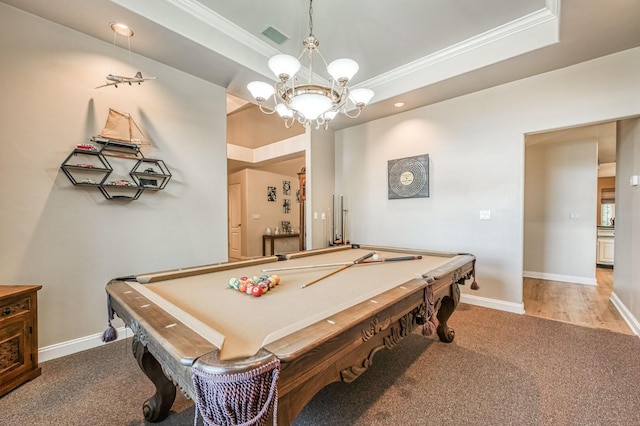 playroom with a raised ceiling, pool table, light colored carpet, and ornamental molding