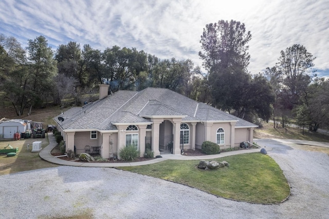 view of front of home with a front yard