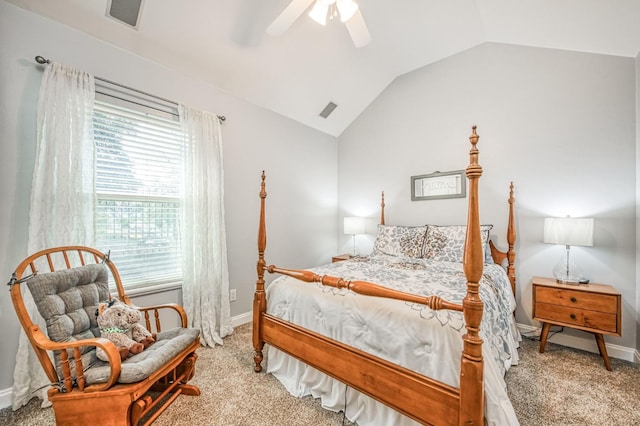 carpeted bedroom with multiple windows, vaulted ceiling, and ceiling fan