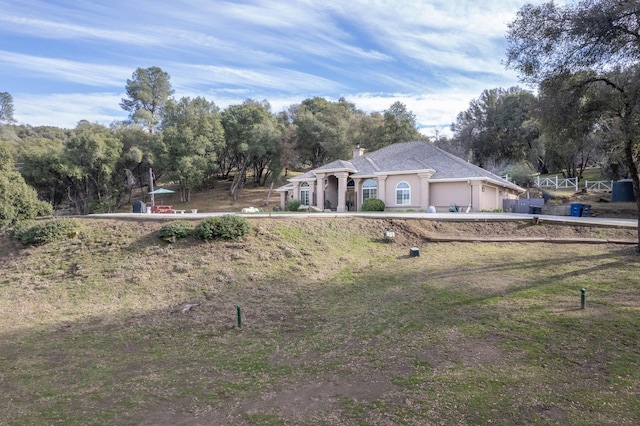 view of yard with a garage