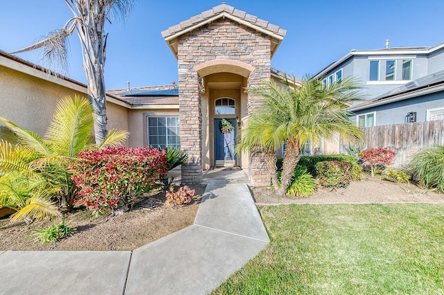 view of front facade featuring a front yard