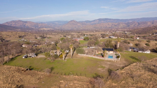 drone / aerial view with a rural view and a mountain view