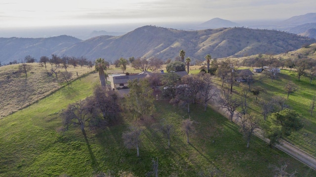 exterior space with a mountain view and a rural view