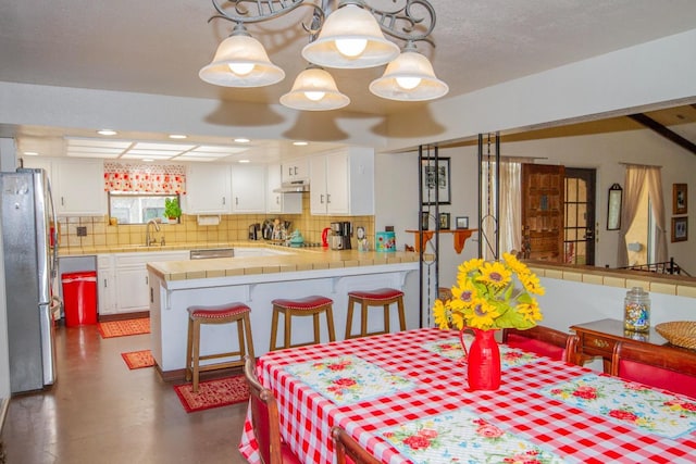 dining area with sink