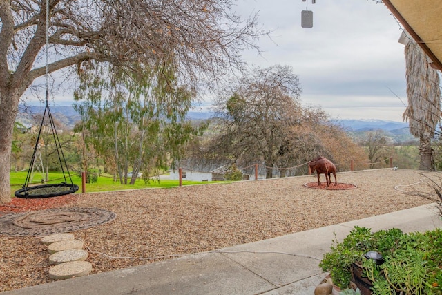 view of yard with a mountain view